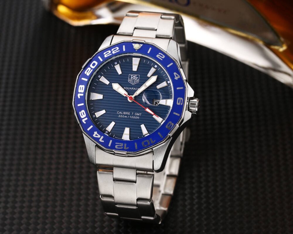 Tag Heuer AQUARACER Watch Product ID: TVG 1243 Blue dial enhanced by luminous silver-tone hands. Silver-tone stainless steel case with a genuine leather band. Quartz movement. 200 meters / 660 feet water resistance. Uni-directional Rotating bezel.