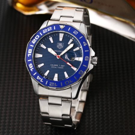 Tag Heuer AQUARACER Watch Product ID: TVG 1243 Blue dial enhanced by luminous silver-tone hands. Silver-tone stainless steel case with a genuine leather band. Quartz movement. 200 meters / 660 feet water resistance. Uni-directional Rotating bezel.